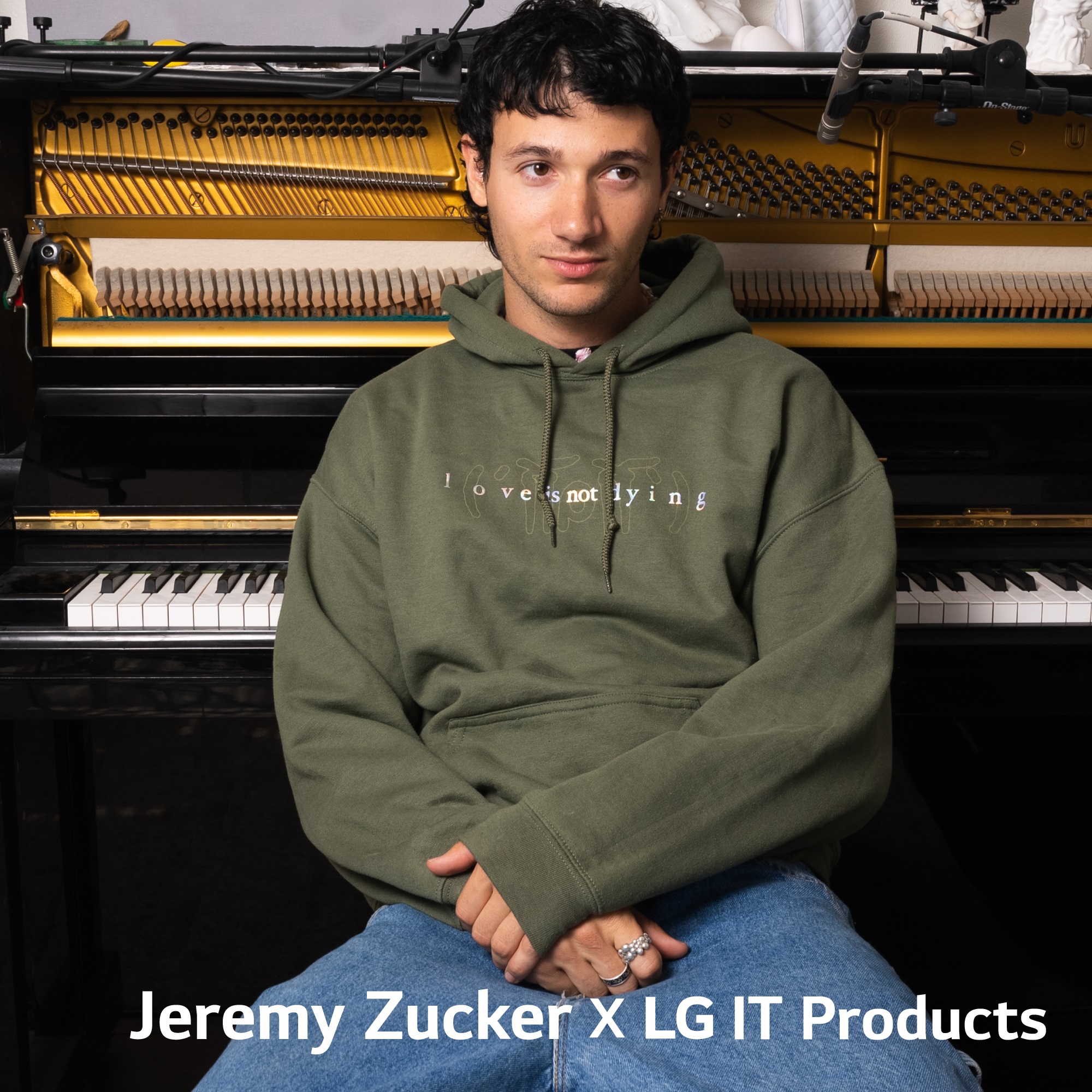 Jeremy Zucker sitting in front of the piano