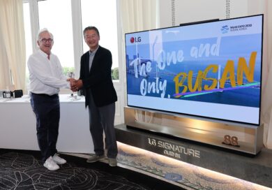Franck Riboud, Honorary Chairman of Danone and Heaven Lee, LG Europe Region Representative at Hotel Royal Evian posing in front of LG SIGNATURE OLED R