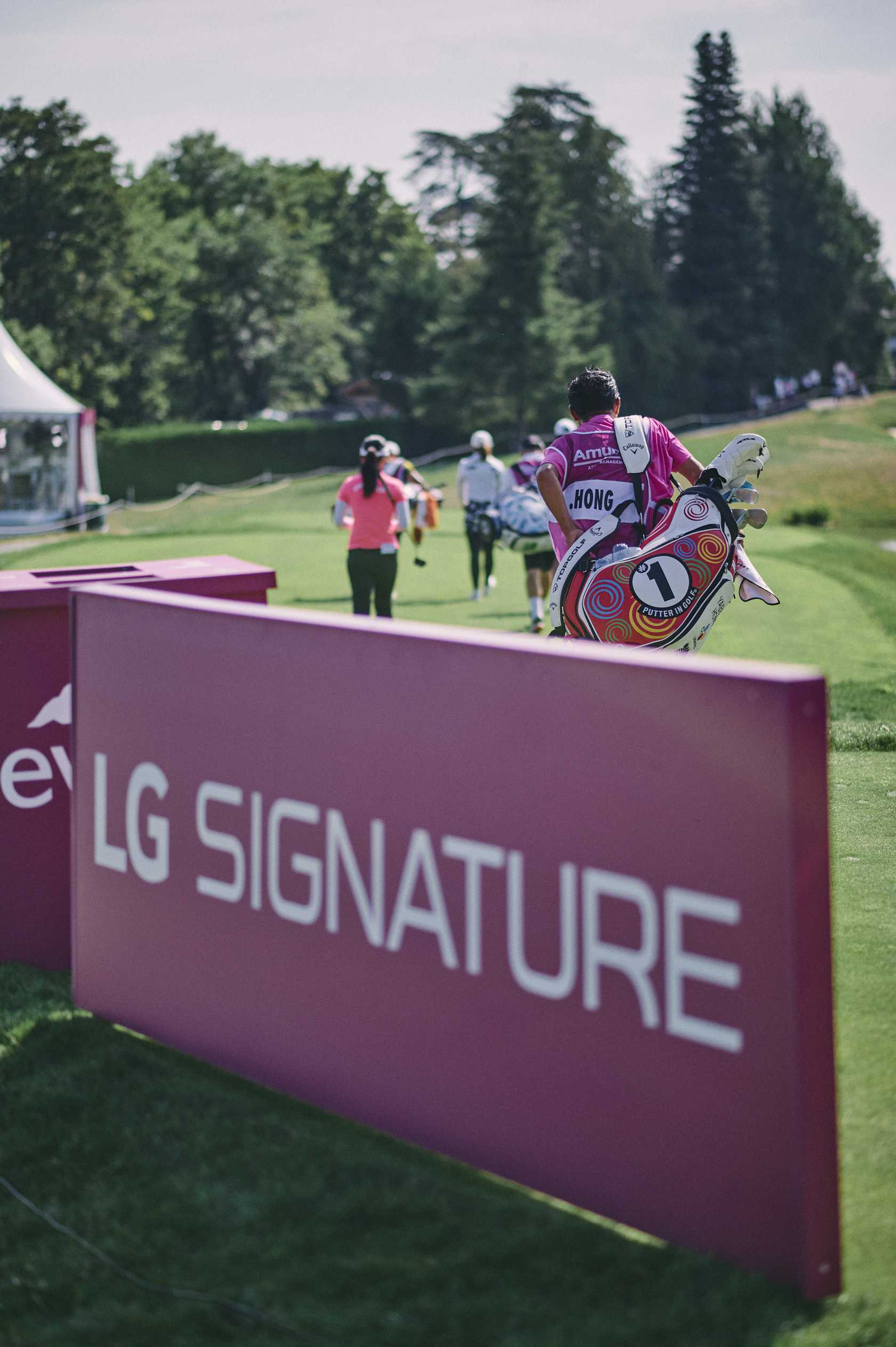 A journey to the tireless pursuit of perfection 06 LG SIGNATURE signage at the Amundi Evian Championship as golfers move through the course