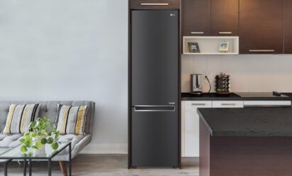 LG's new bottom freezer with top-tier energy efficiency is in the refrigerator cabinet in the kitchen