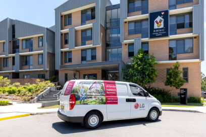 A photo of LG's van parked at the front of RMHC building to donate a few LG products