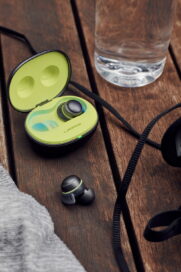 LG TONE Free fit earbuds and UVnano charging case on a table