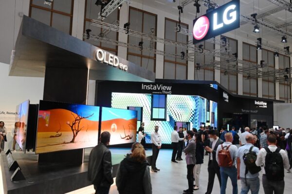 Many visitors walking around and taking a closer look at products showcased at LG Booth during IFA 2022