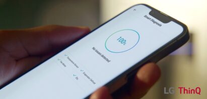 A smartphone running the LG ThinQ app’s Smart Diagnosis feature