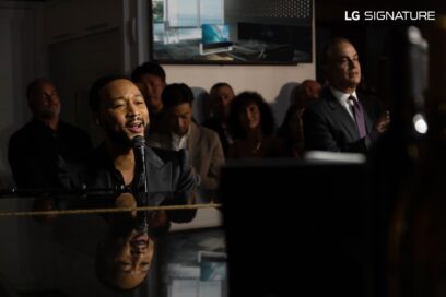 Singer-songwriter John Legend performing with a piano at an offsite VIP customer event for CEDIA Expo 2022