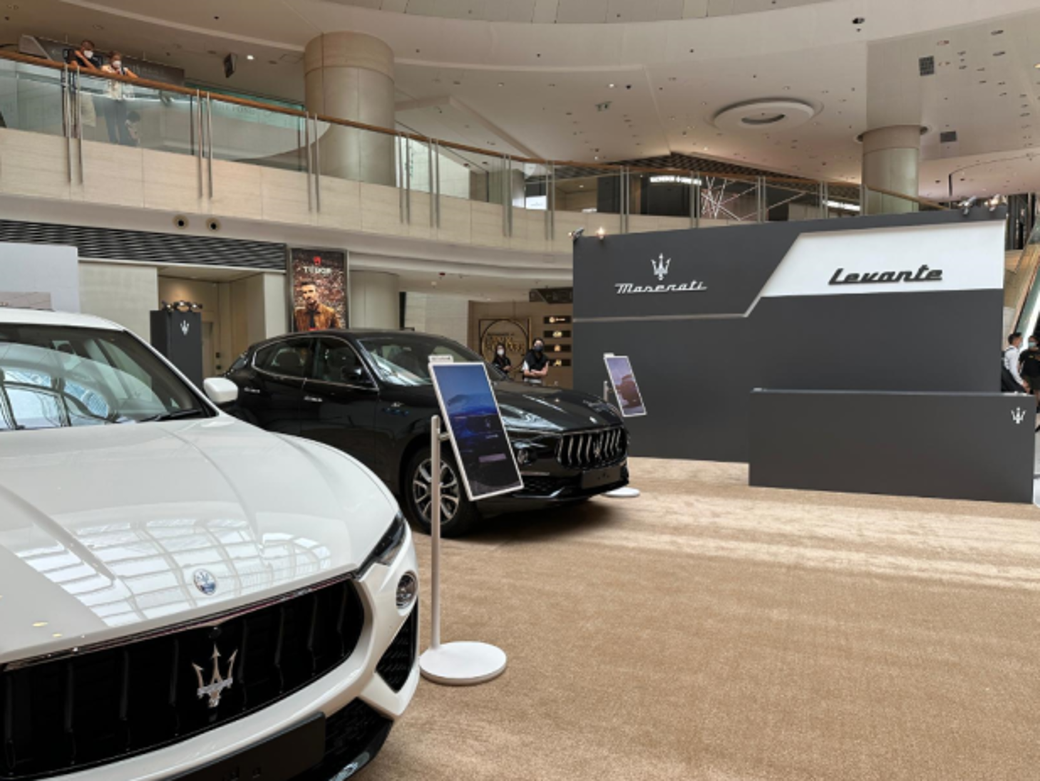 LG StanbyME installed next to the Maserati's luxurious automobiles at Maserati showroom in Hong Kong