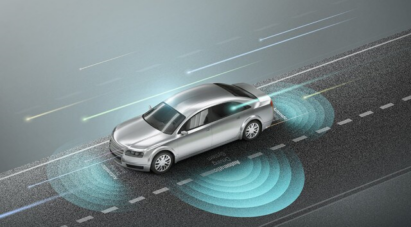 An automobile on the road with activated sensors