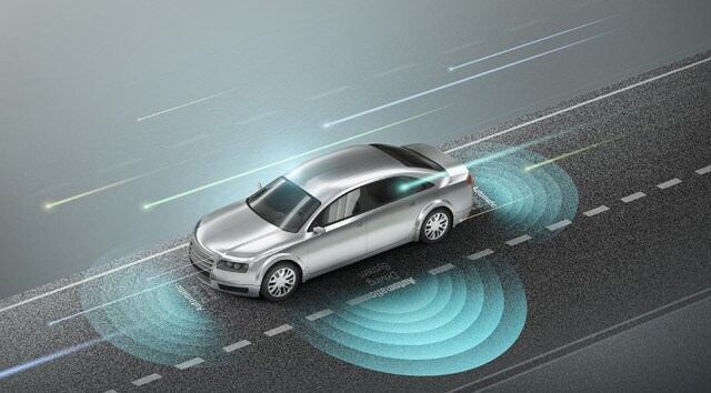 An automobile on the road with activated sensors 