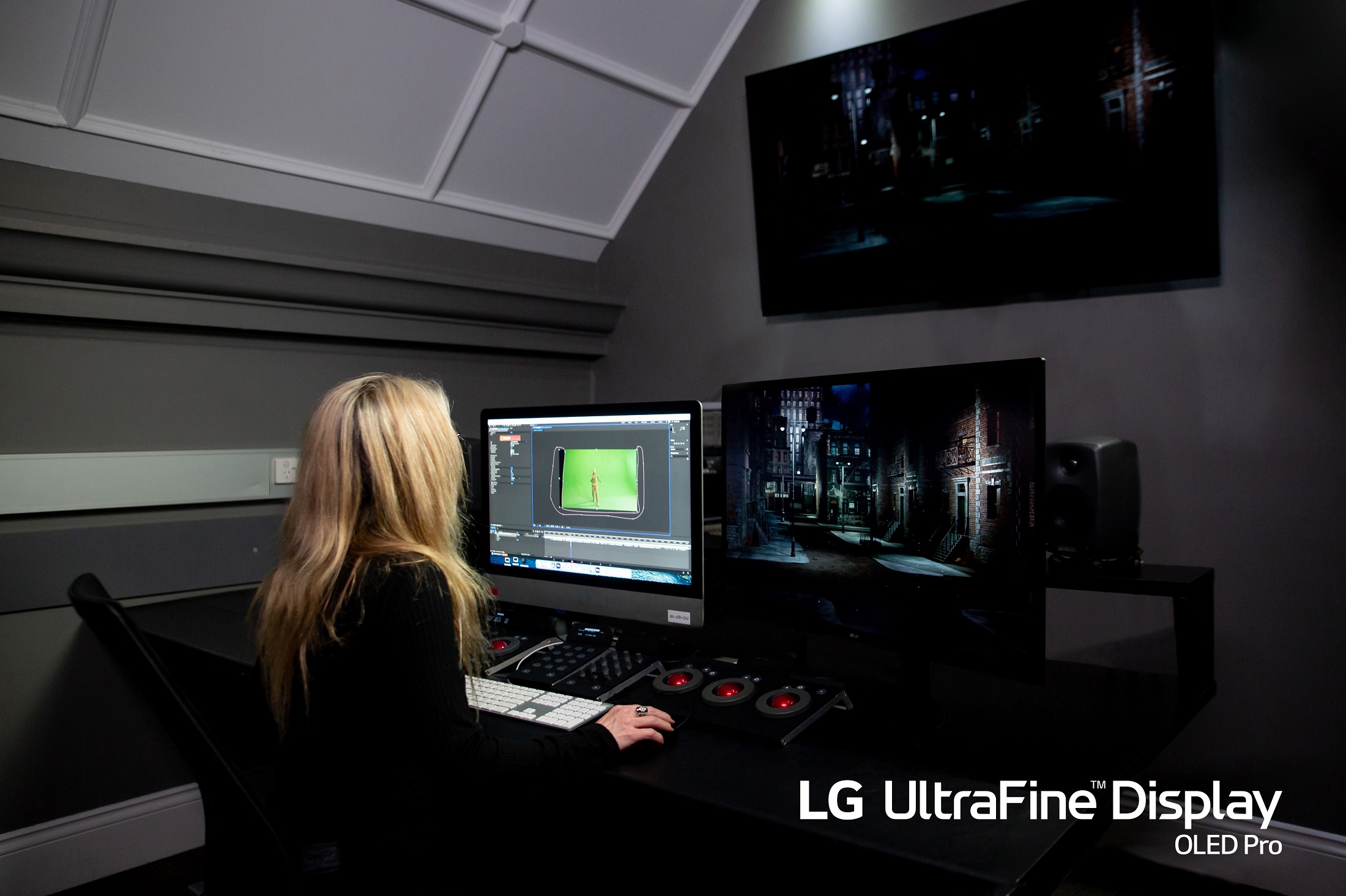 A woman working on LG UltraFine Display OLED Pro