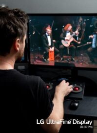 A man working on LG UltraFine Display OLED Pro