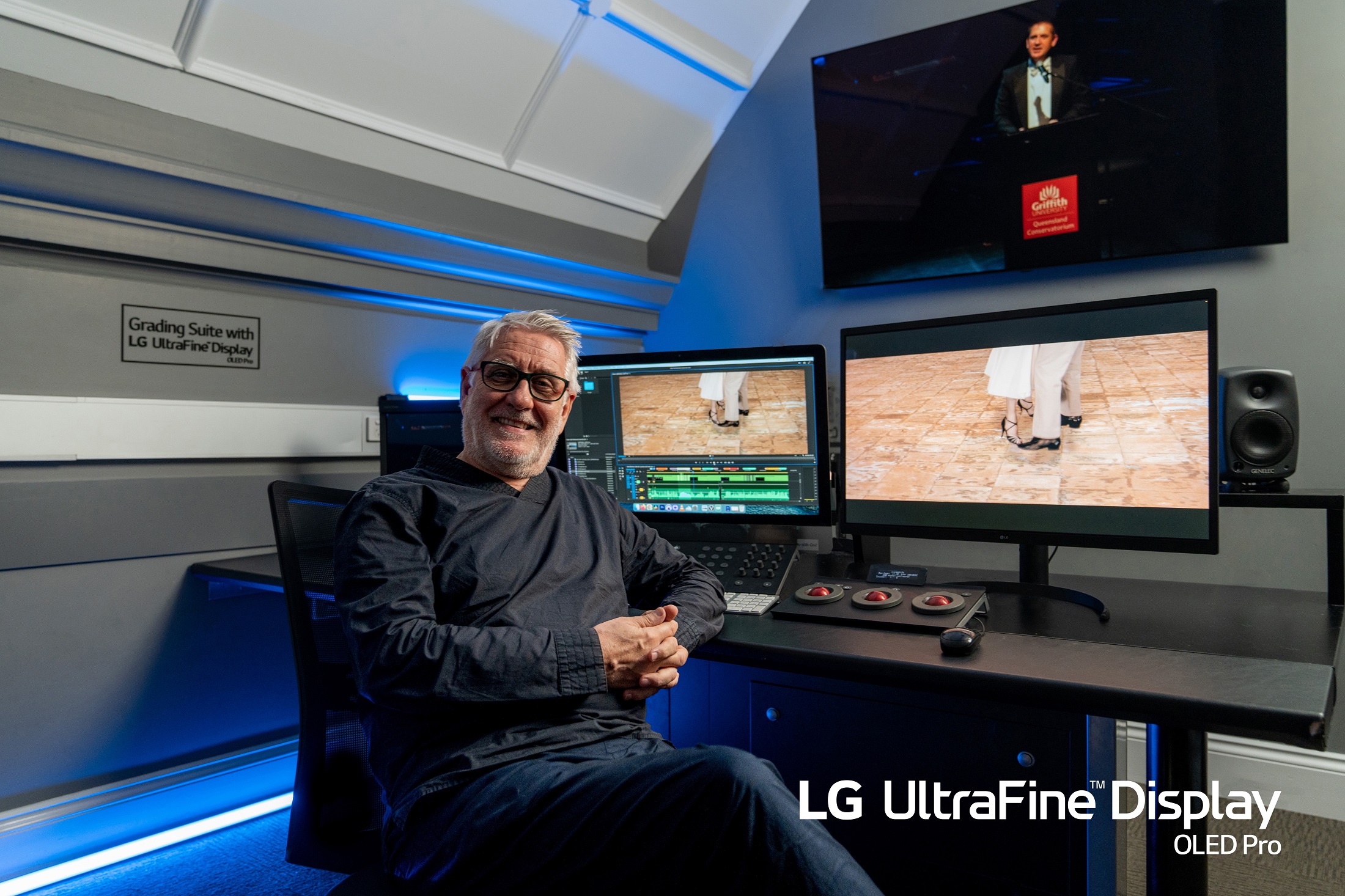 Herman Van Eyken, head professor at Griffith Film School, posing at his desk where LG UltraFine Display OLED Pro is installed