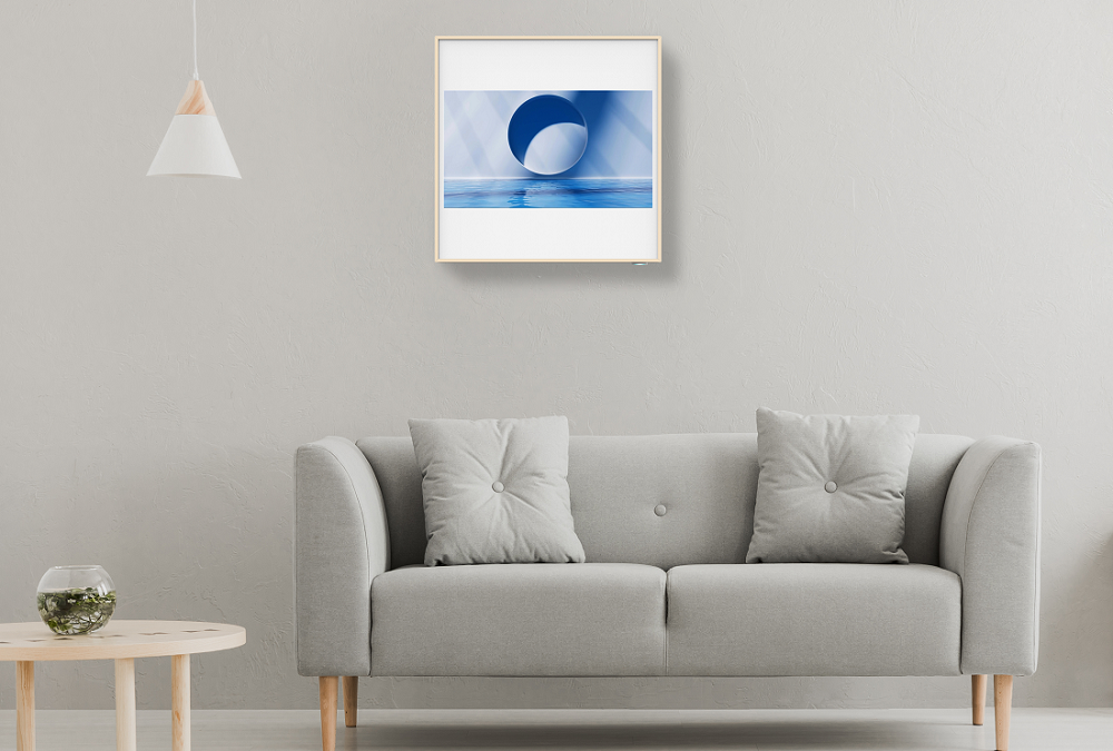 LG’s new ARTCOOL™ Gallery air conditioner installed on the wall above the sofa.
