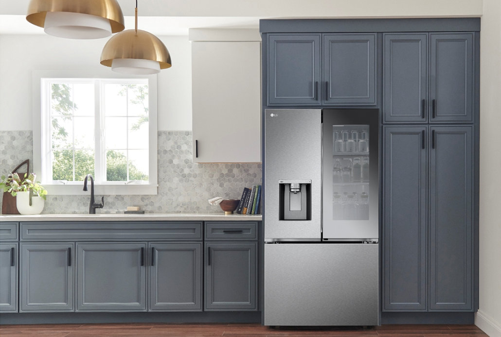LG’s new InstaView™ French-Door refrigerator installed in the kitchen between the built-in drawers.