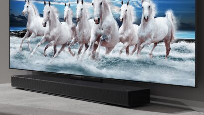 New LG Soundbar installed below an LG TV as it presents images of horses running through a river