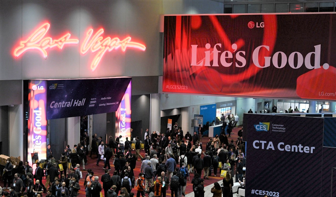 The entrance of LG booth at CES 2023 where a promotional LG poster is hanging from above