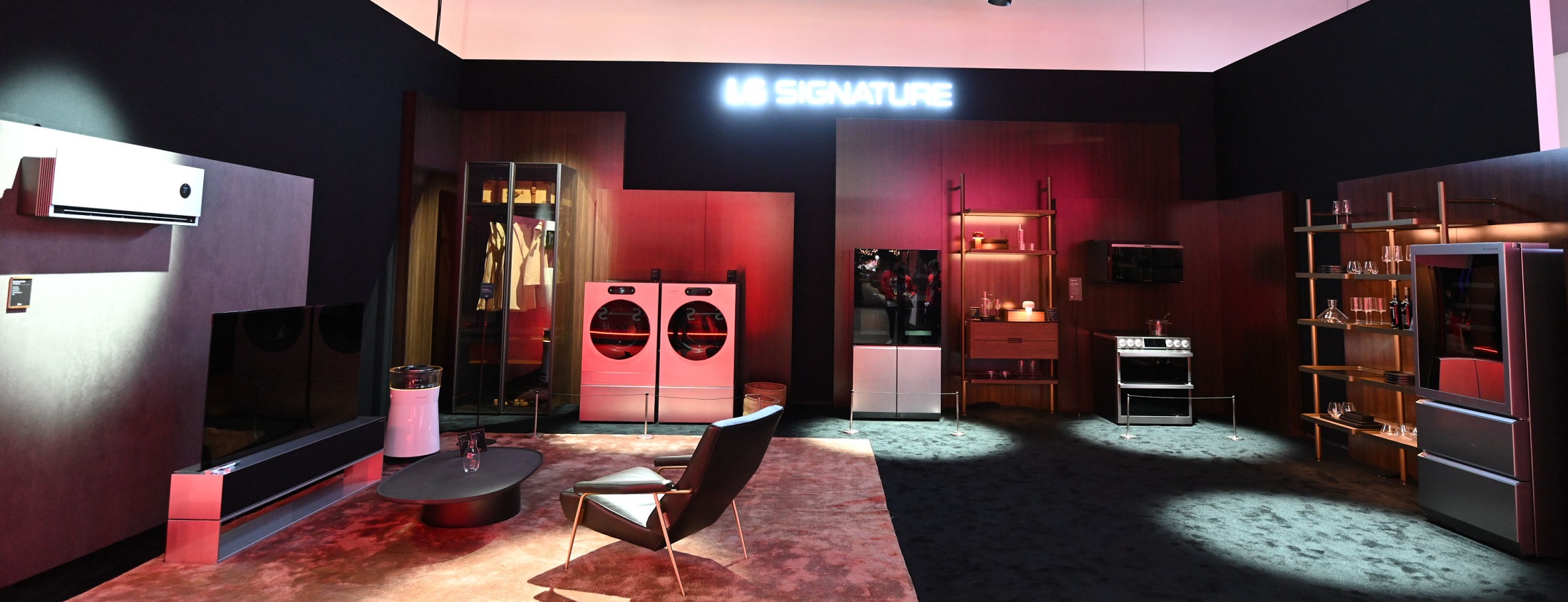 A room filled with the second generation of LG SIGNATURE products including OLED R, Dual InstaView™ refrigerator, a washer and dryer pair, air conditioner, air purifier and the Wine Cellar