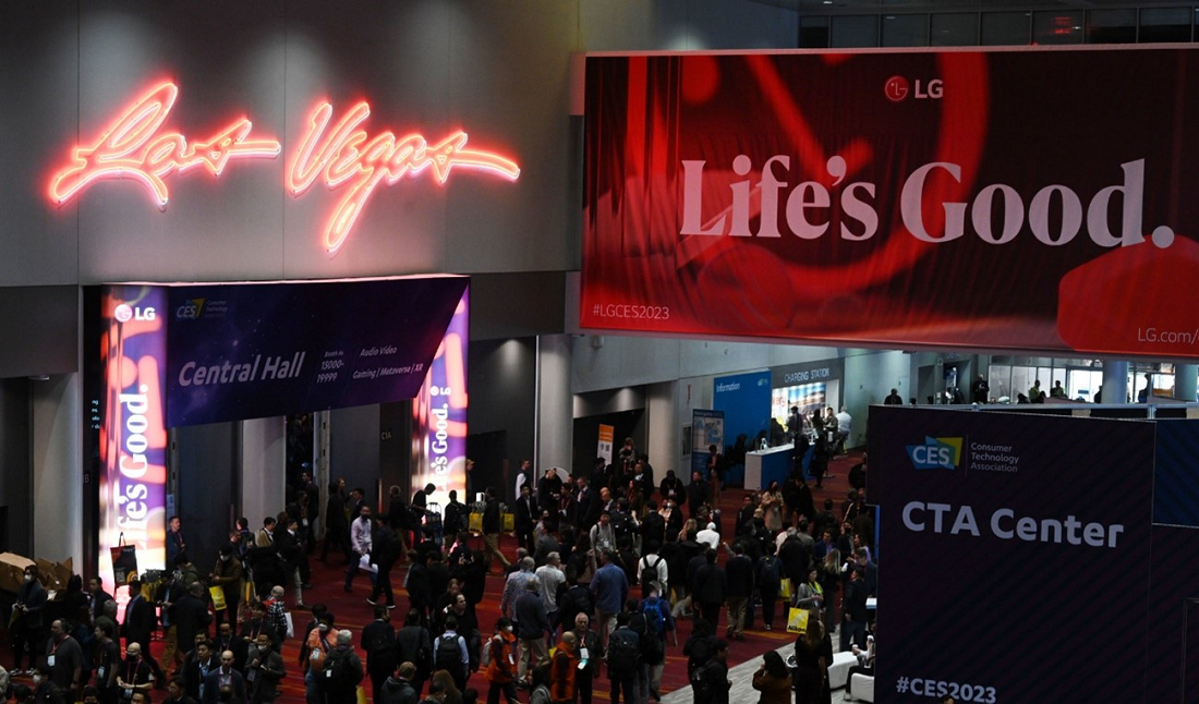 The entrance of LG booth at CES 2023 where a promotional LG poster is hanging from above