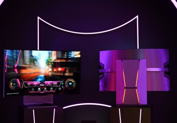 A front and rear view of LG OLED Flex, with the screen displaying racing gameplay