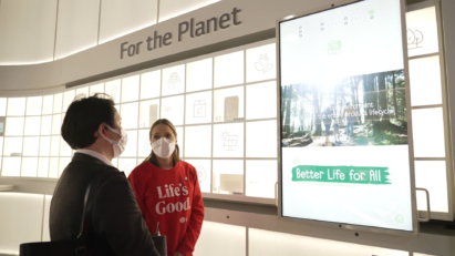 A visitor looking at the display installed at the LG Better Life for All zone during CES 2023
