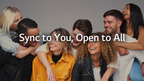 LG’s new vision statement, “Sync to You, Open to All,” overlaying a group of friends smiling