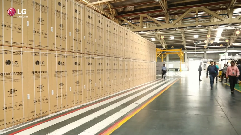 A large number of LG side-by-side refrigerators stored inside the India Pune manufacturing facility. 