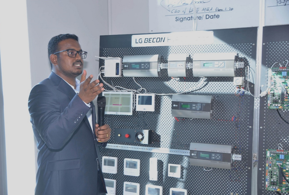 Raja Durai, technical engineer at LG East Africa, explaining LG BECON HVAC Solution at LG East Africa’s HVAC showroom. 