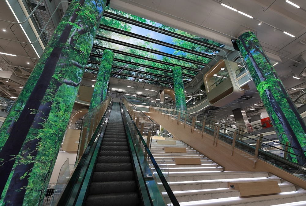 LG’s LED signage expressing images of a forest on the ceiling and pillars of Bangkok’s True Digital Park West.