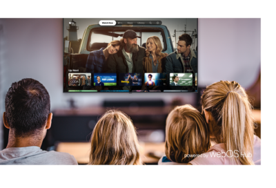 A family of four browsing the Apple TV Watch Now page via the newly released LG webOS Hub 2.0