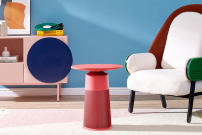 A lifestyle image of LG PuriCare Aero Furniture in Crème Rose against a modern, color-popping living room backdrop.