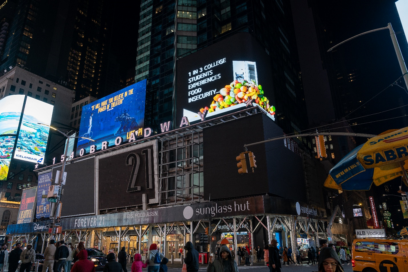 LG's collaboration with Swipe Out Hunger being displayed on a billboard at Times Square, New York