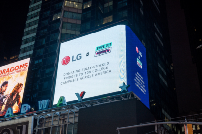 A close-up photo of a billboard in Times Square, New York displaying a collaboration of LG with Swipe Out Hunger