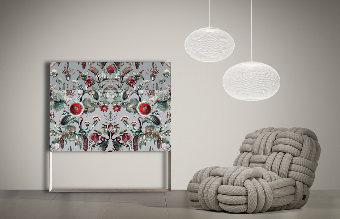 LG OLED Objet Collection Posé featuring a design created by Dutch brand Moooi as it leans against the wall next to bright round lights and a stylish white Moooi sofa