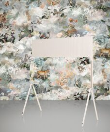 The back of LG OLED Objet Collection Posé in front of wall artwork inspired by traditional Korean folktales