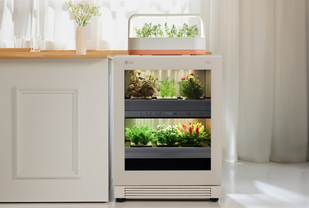 A front view of LG tiiun Nature Beige indoor gardening appliance with tiiun mini on its top