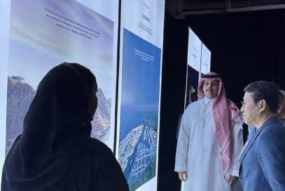 LG CEO Cho taking a look at a sign which explains NEOM City Project