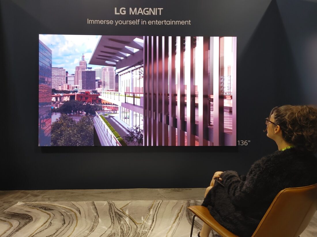 A visitor taking a look at LG MAGNIT installed at HITEC 2023