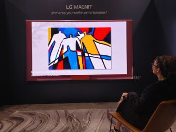 A visitor taking a look at LG MAGNIT installed at HITEC 2023