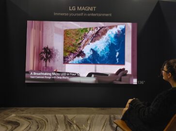 A visitor taking a look at LG MAGNIT installed at HITEC 2023