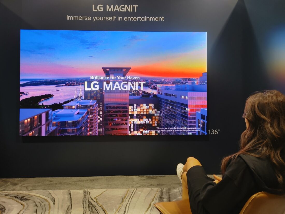 A visitor taking a look at LG MAGNIT installed at HITEC 2023