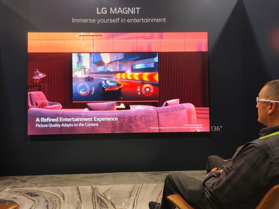 A visitor taking a look at LG MAGNIT installed at HITEC 2023