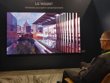 A visitor taking a look at LG MAGNIT installed at HITEC 2023