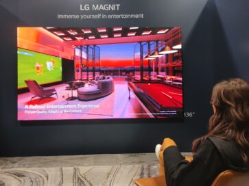 A visitor taking a look at LG MAGNIT installed at HITEC 2023