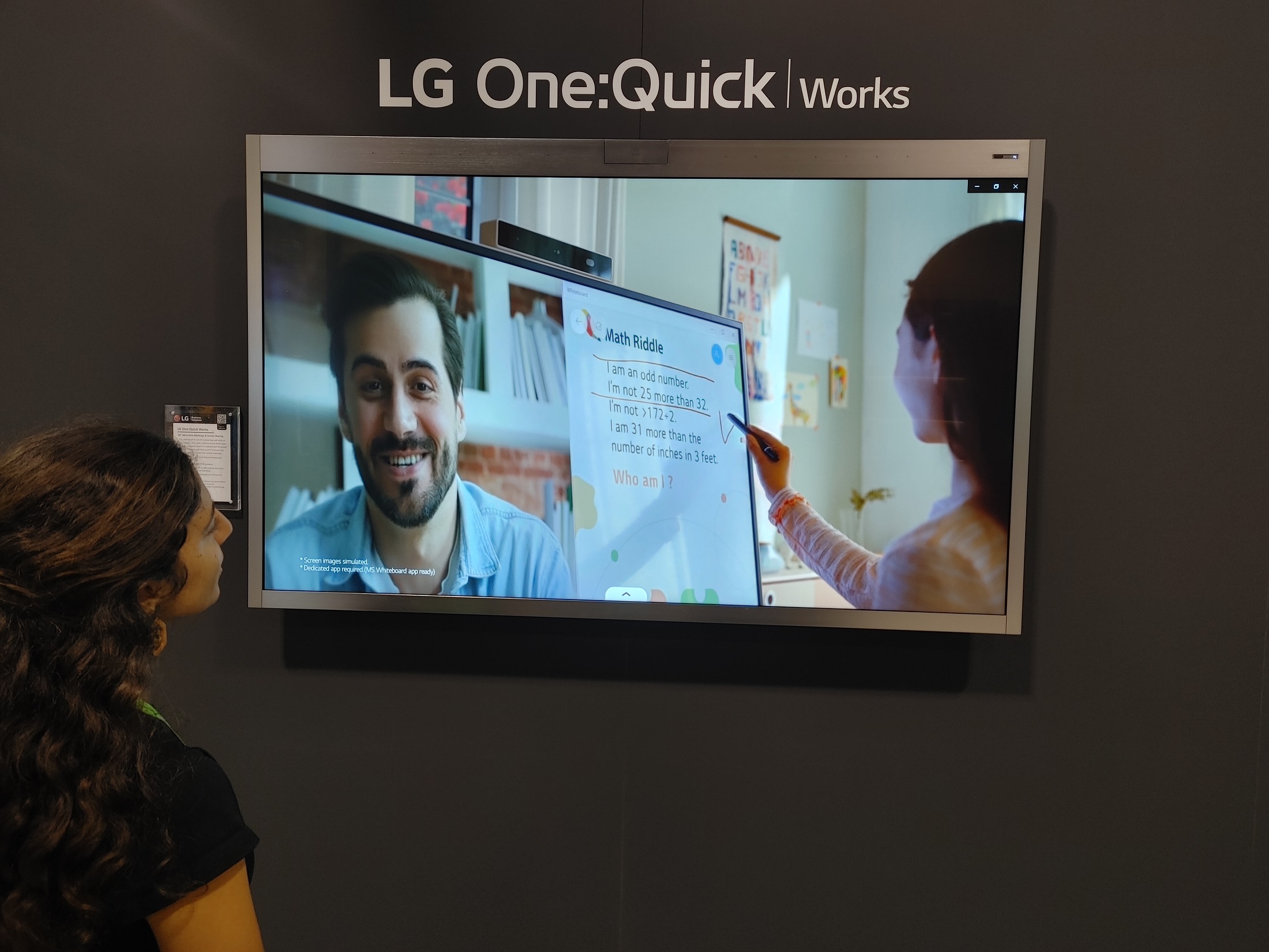 A visitor enjoying a first-hand experience of LG One:Quick Works