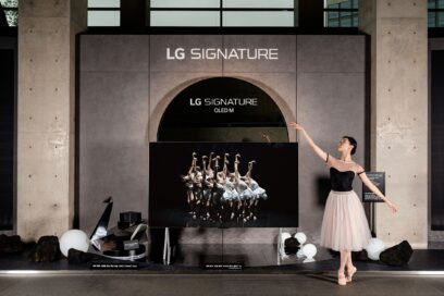 A ballerina posing next to LG SIGNATURE OLED M installed at LG Arts Center SEOUL