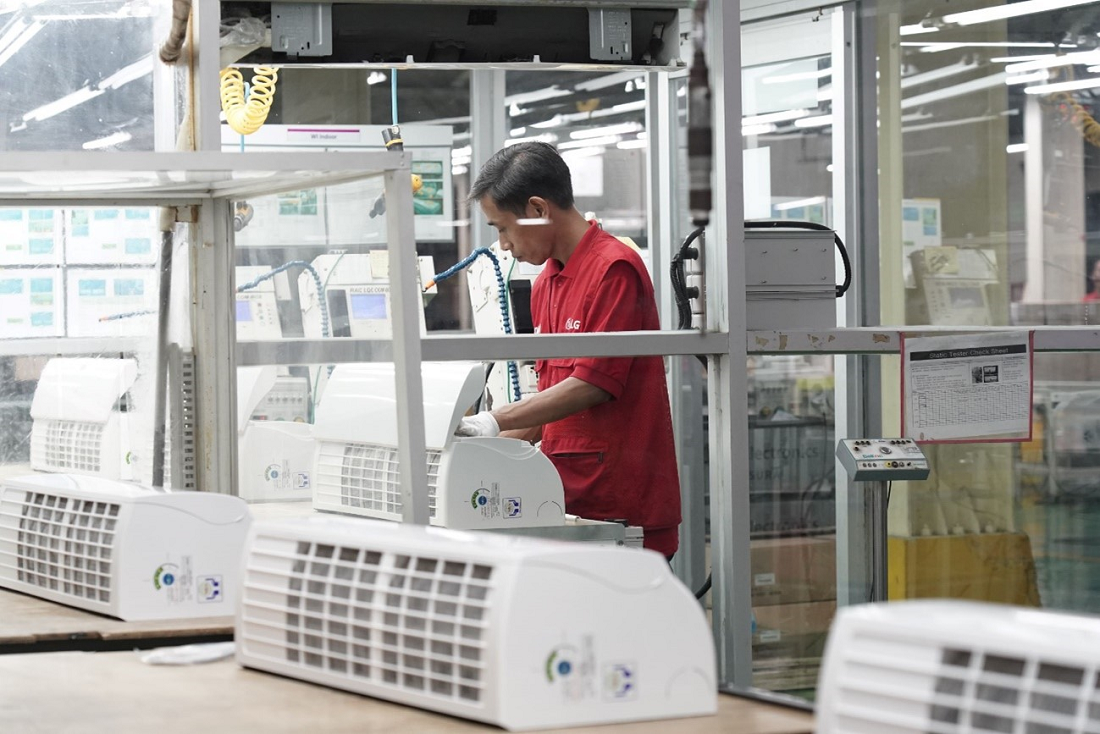 A photo of a worker at the newly expanded factory to produce LG appliances