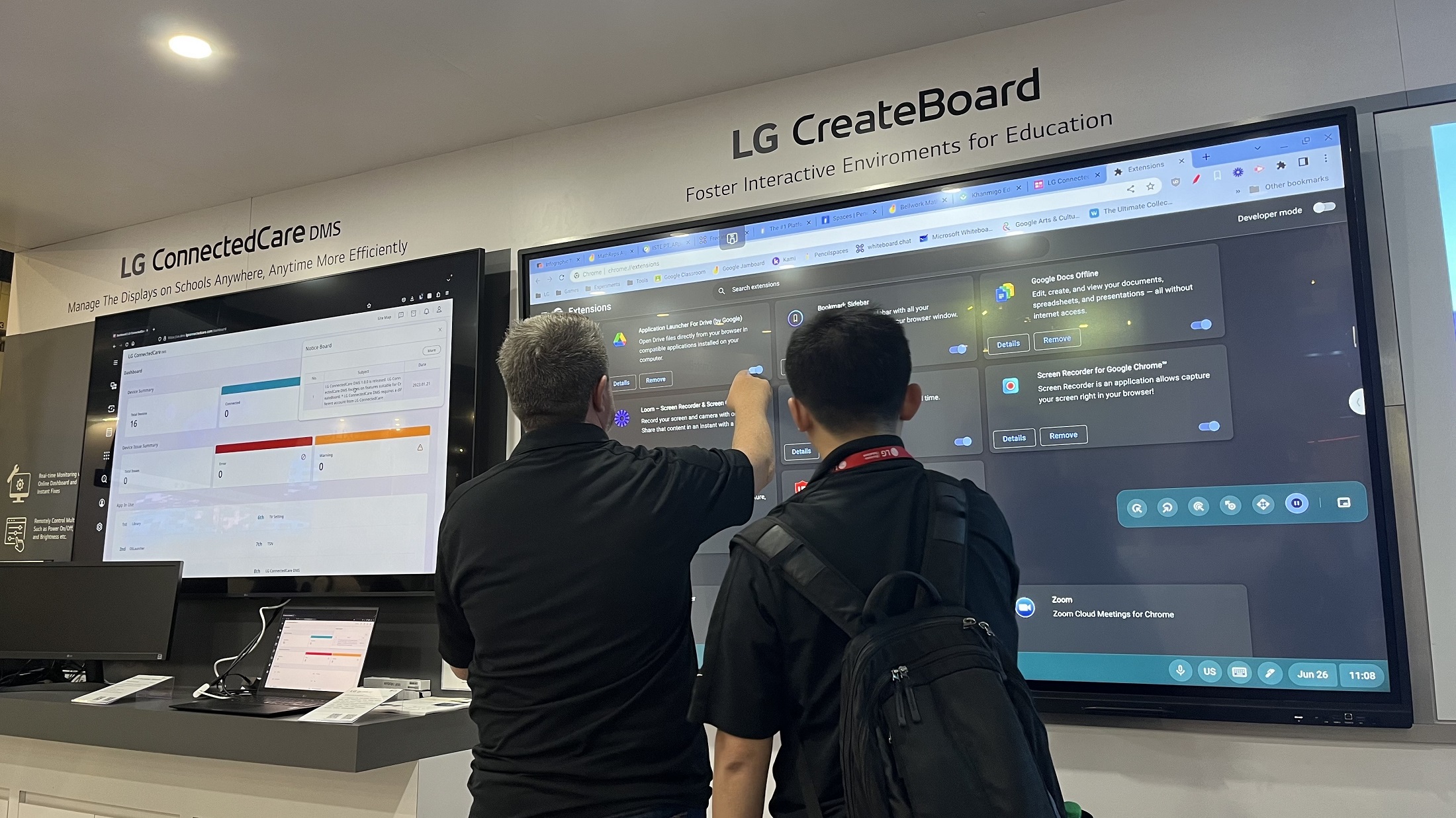 A man pointing at LG CreateBoard screen