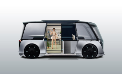 LG OMNIPOD concept car with Reah Keem on its door