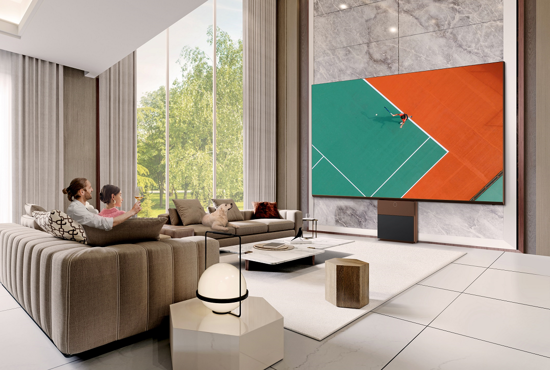 People watching sports games on LG MAGNIT in the living room