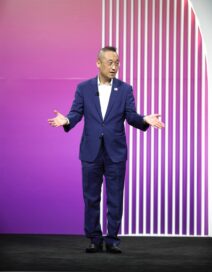 Sokwoo Rhee, Head of LG NOVA and SVP of Innovation for LG Electronics, on a podium giving a speech