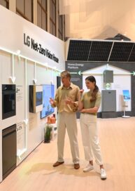 Two people at LG booth prepared for IFA 2023